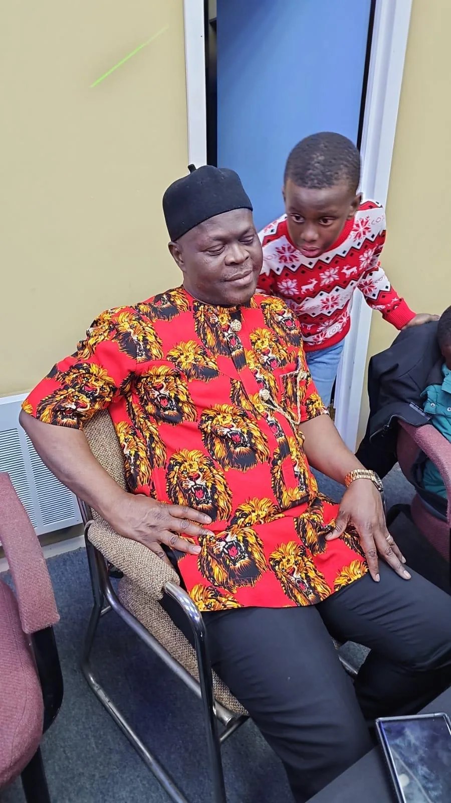 Community member wearing colourful traditional attire