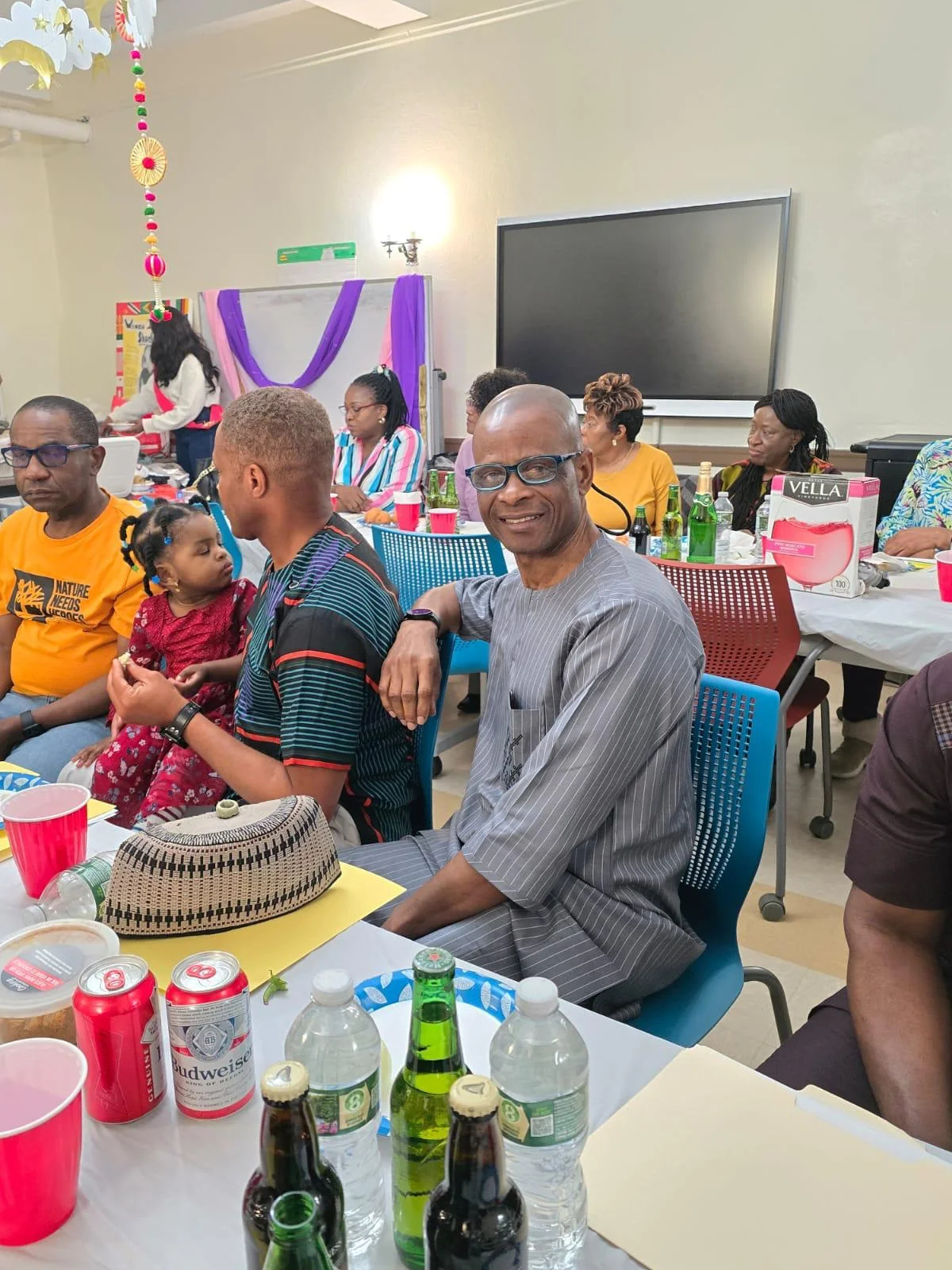 Older and younger community members together at an event